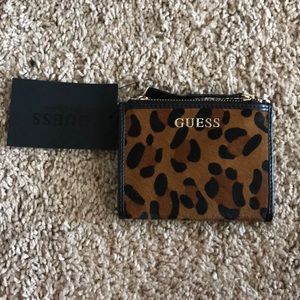 Brand new Guess leopard print wallet.